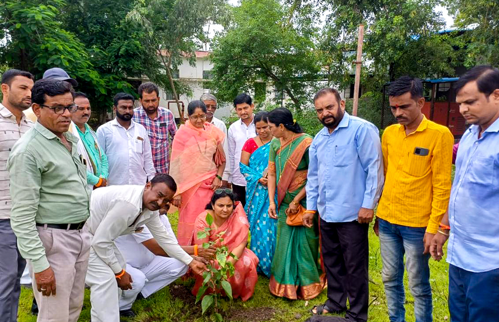 Nirmal Seeds team members planting trees during annual tree-plantation drive